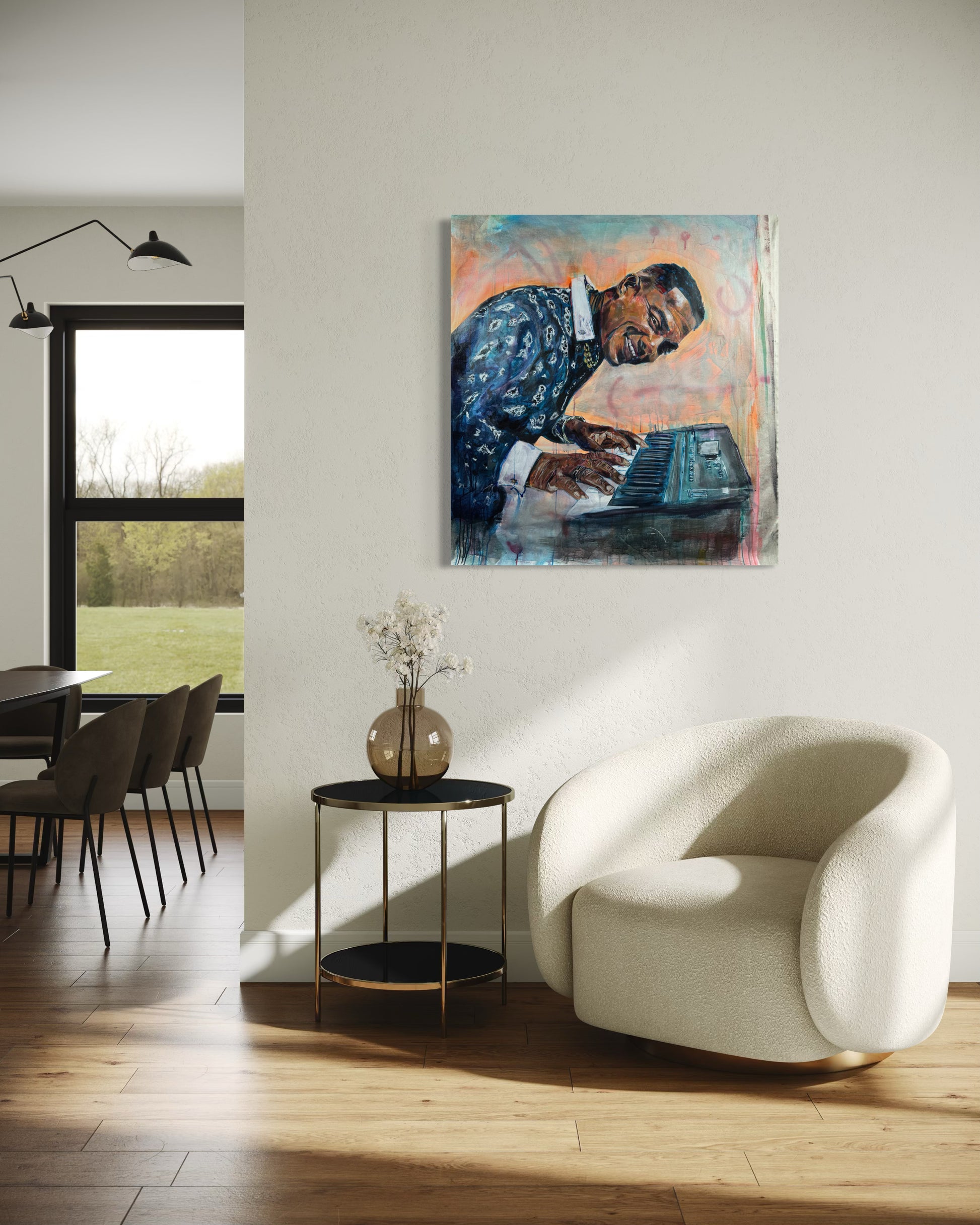 Manolito y su Trabuco above white sofa with cushion sand vase