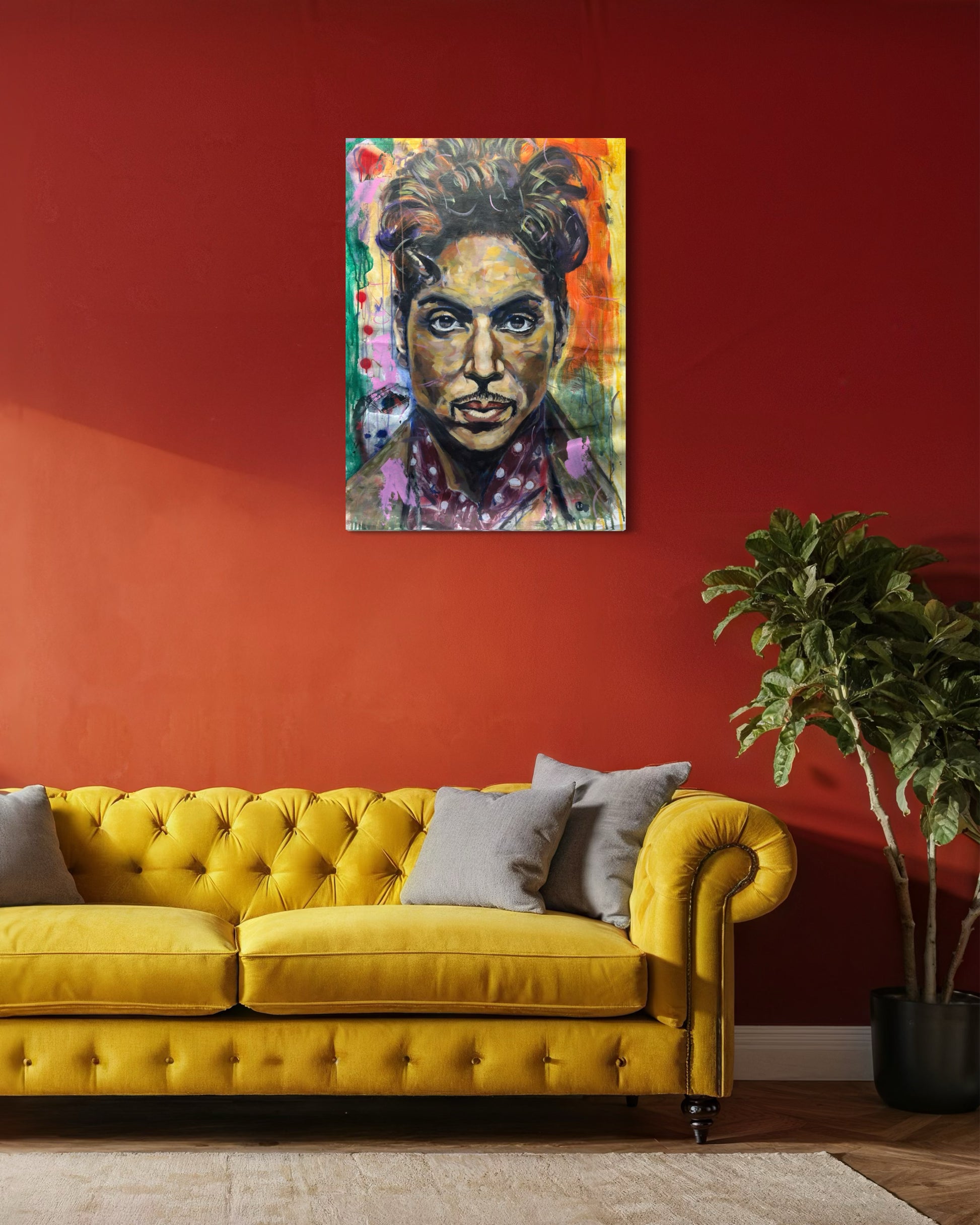 Prince Portrait Original Painting above a yellow velvet couch and red wall
