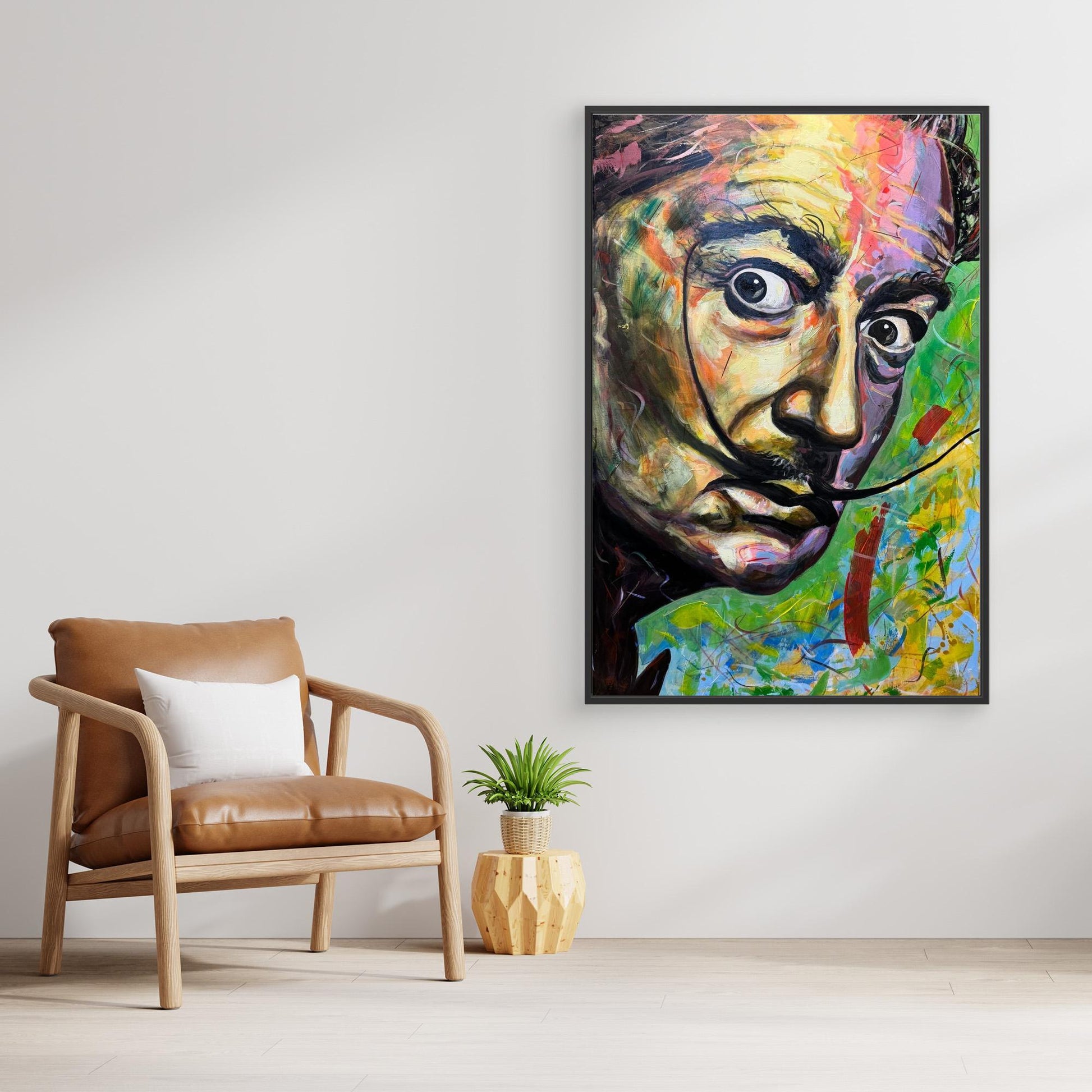 SALVADOR DALI canvas artwork displayed above stylish chair