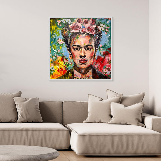 FRIDA KAHLO 1 Portrait Canvas Print hanging above beige sofa in stylish interior setting